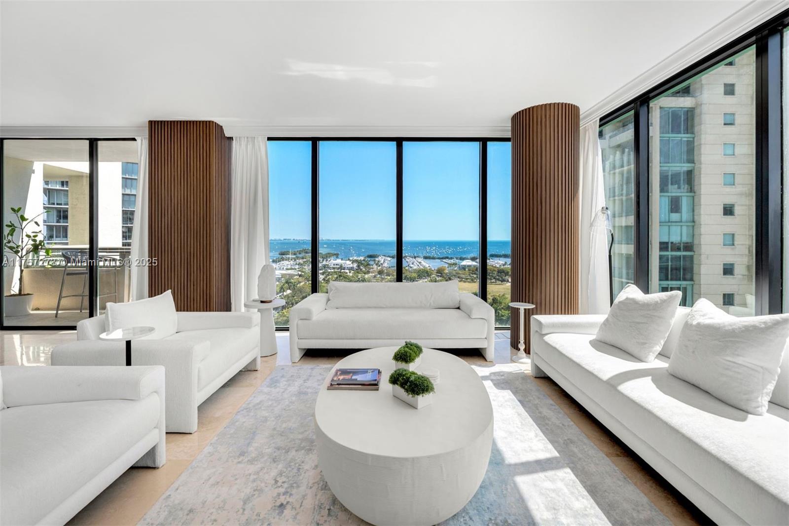 Indulge in the epitome of luxury at The Ritz-Carlton Executive Residences in Coconut Grove w/ this exquisitely remodeled 3BR/3.5BTH corner residence, offering breathtaking views of the bay and Coral Gables. Over 200k in upgrades! Meticulously designed w/ custom millwork, LED lighting, & refined finishes, the spacious split floor plan features a serene primary suite w/ a spa-inspired bath and bespoke closet. The chef’s kitchen is perfect for entertaining, showcasing stainless steel appliances & a stunning quartz waterfall island. Just steps from Fresh Market, renowned dining, parks, & The Cocowalk, enjoy access to Ritz-Carlton’s unparalleled amenities, including valet, concierge, hair salon, pool, spa, Isabelle’s, & Commodore Bar. A truly move-in ready gem-seize this rare opportunity!