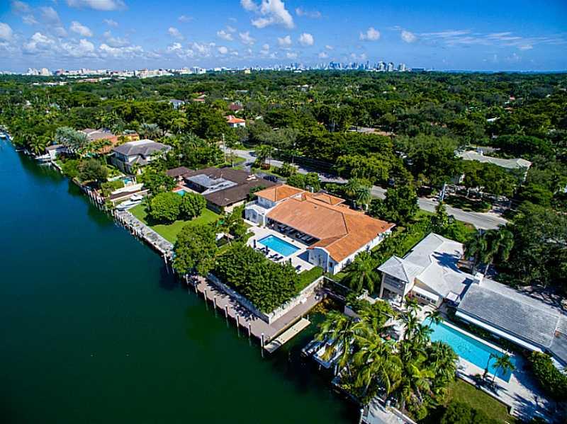 With 125 ft. of water frontage and 2 boat slips, this fully remodeled 6BR/6BA gem is perfectly situated along the Coral Gables Waterway. French doors line the back of the home while views of the canal and open spaces come together to create a bright, airy , and welcoming atmosphere. The exquisite custom kitchen features top-of-the-line Miele and Sub-Zero appliances along with quartz countertops. Ceramic tile floors are used throughout the home while the bedrooms all contain beautiful dark hardwood floors.