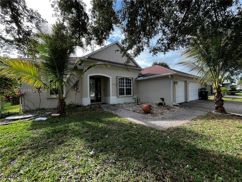 Photo of 1420 NW Dimperio Ave, Port St Lucie, FL 34953 (MLS # A12027323)