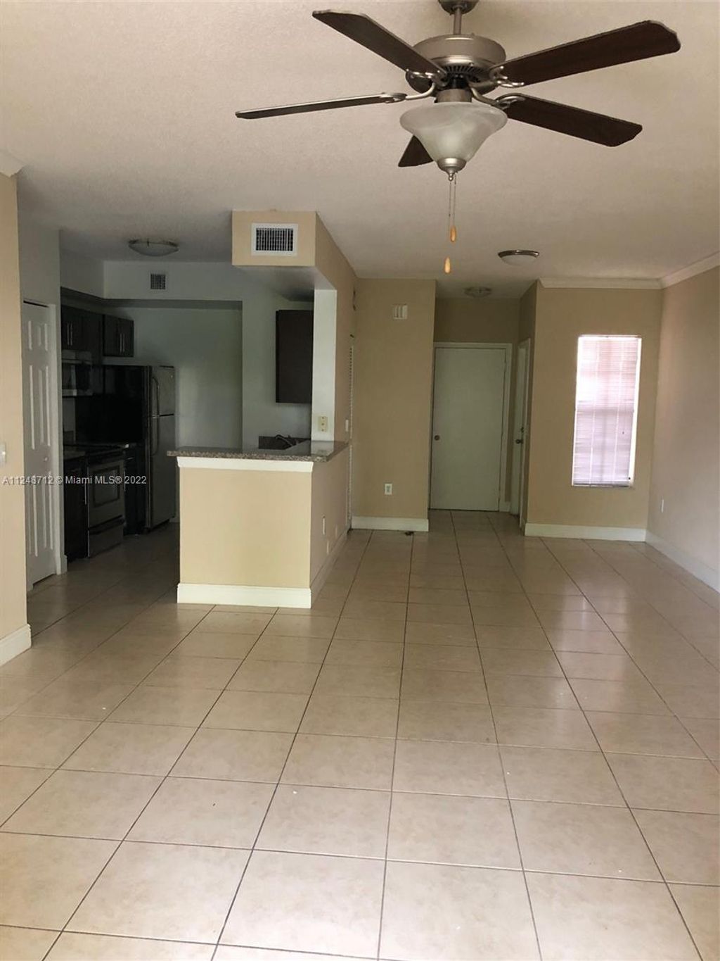 Photo of 2486 Centergate Dr #103, Miramar, FL 33025 (MLS # A11248712)