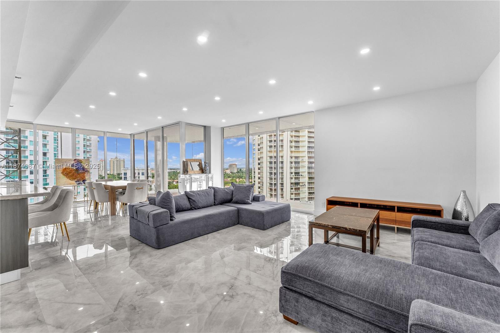 Completely renovated 3-bedroom at elegant Turnberry Towers with stunning Intracoastal and Ocean views through floor-to-ceiling windows. Wraparound terrace currently not accessible due to building renovations. Features marble floors throughout, glass kitchen cabinets, stainless steel appliances, quartz counters, and breakfast bar. Spacious master with custom closets. Washer and dryer in unit. Includes cable, WiFi, approx. 30 sq.ft. storage, and 2 garage spaces with valet. Amenities: 24/7 security, Shabbat elevator, fitness center, club and card rooms. Walk to golf course trail and Synagogue. Minutes to Aventura Mall, Publix, I-95, schools, and beaches. Free Aventura Shuttle stops at the building. Available Furnished or Unfurnished.