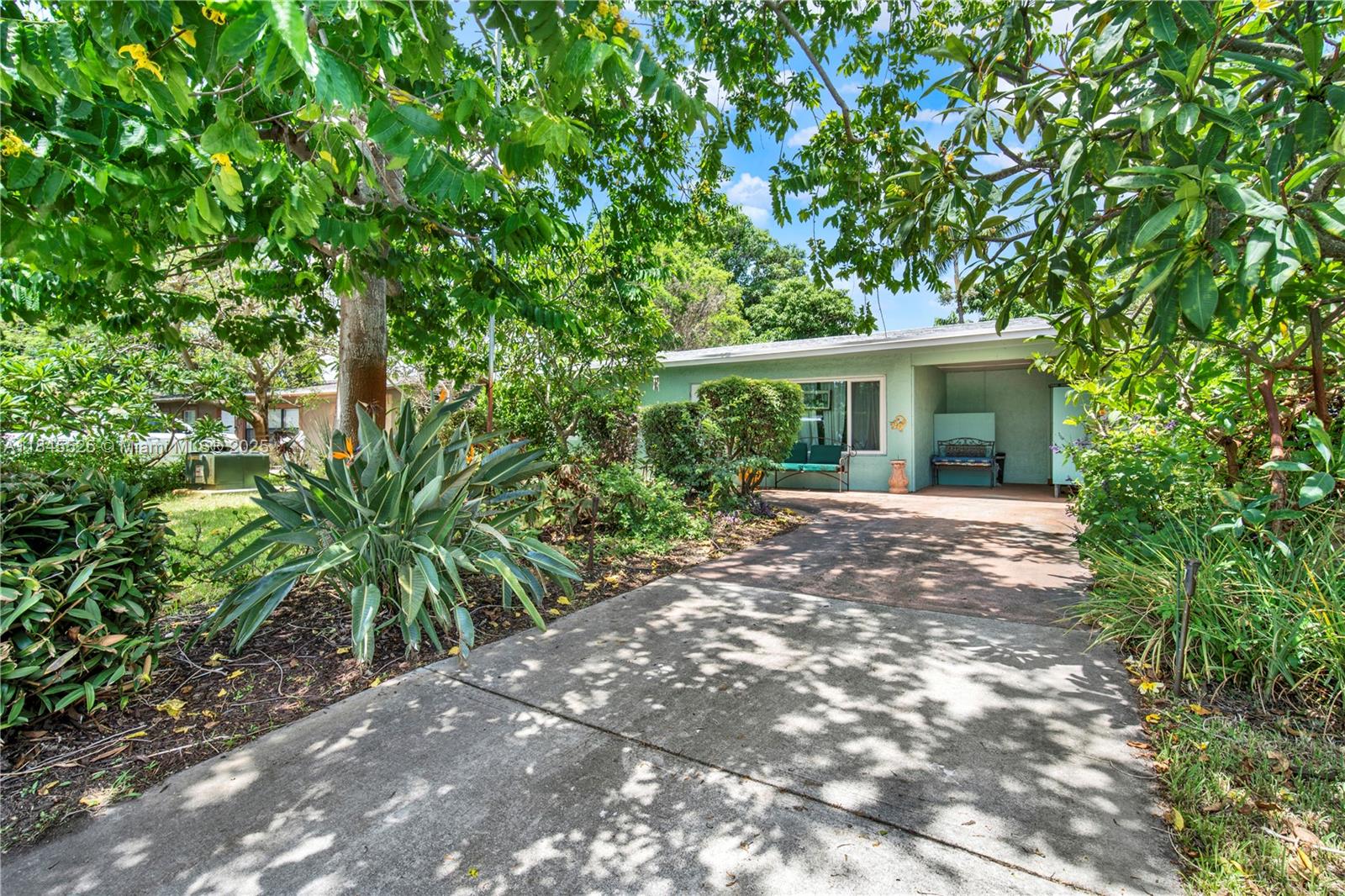 Turnkey Investment or Perfect first home - either way, it's a win. Located in the heart of Pompano Beach, this fully updated 3-Bedroom, 1-Bath Single-Family Home features a NEW ROOF, NEW A/C, and COMPLETE Impact Windows and Doors. Cast Iron pipes have also been replaced. Private Backyard with Lush landscaping, Tropical Trees and a Koa Pond. Located just minutes from Pompano Beach Golf Course, Air Park, and the Newly Redeveloped Pompano Beach Pier with restaurants, shops, and entertainment. Ideal for first-time buyers or as a turnkey Airbnb investment in a high-demand area. No HOA.