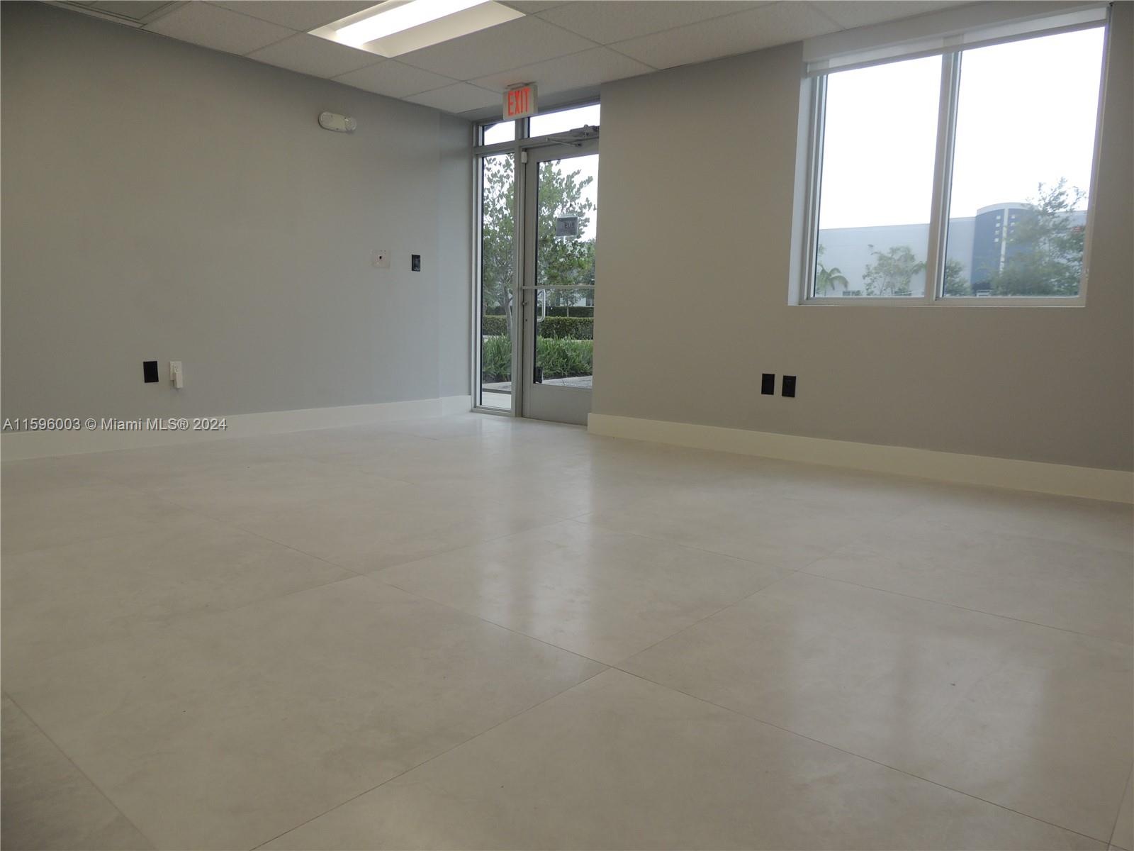 Great Opportunity! This unique commercial warehouse at Pan American Business Park in Miami offers approximately 2,500 square feet of FULLY air-conditioned space, including 2,000 square feet on the first floor and 500 square feet on an open mezzanine. The property features a lobby/office and a conference/office area, street-level loading, 21-feet ceiling height, and a fire sprinkler system. It includes five assigned parking spaces plus additional guest parking and provides easy access to the Turnpike and 836 Dolphin Expressway. The location is just minutes from Miami International Mall and Dolphin Mall. Available under a gross lease, this property is a great investment opportunity.