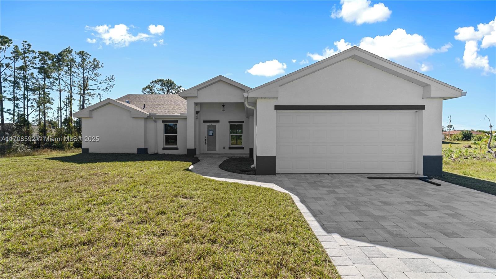 Welcome to this stunning brand-new construction home in the heart of Lehigh Acres, FL! This spacious 4-bedroom, 2-bathroom property boasts luxurious features, including sleek marble floors throughout and beautifully designed, modern bathrooms. The open-concept layout offers an abundance of natural light and space, perfect for both family living and entertaining. Located in a prime area, this home is just minutes away from shopping, dining, and major highways, making it ideal for both convenience and comfort. Don't miss out on the opportunity to own this gorgeous, move-in-ready home. Contact listing agent for fast financing assistance. Bring your offers for this larger than average deal of a life time!