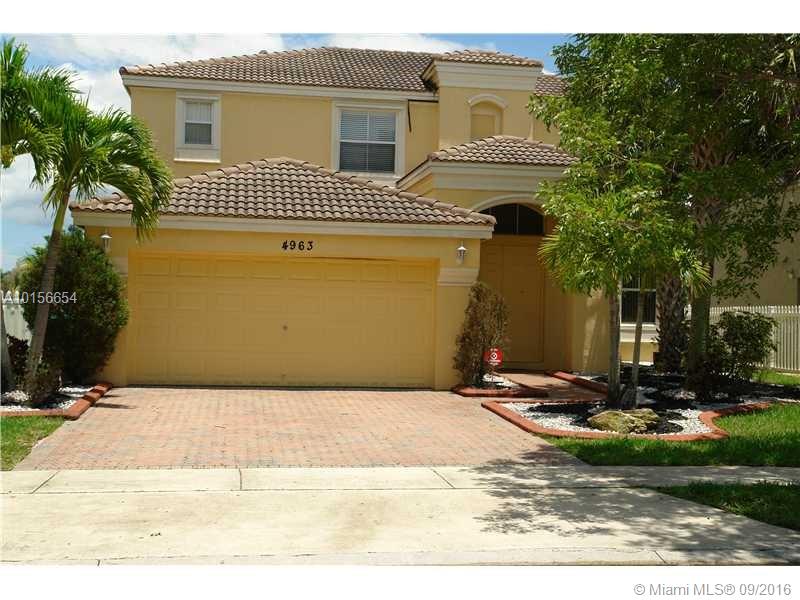 Single family home in Riviera Isles!!! Beautiful lake view with a huge private yard for entertaining. Tile through living areas and carpet in the second floor. One bedroom downstairs with full bath. Spacious family room and kitchen area.