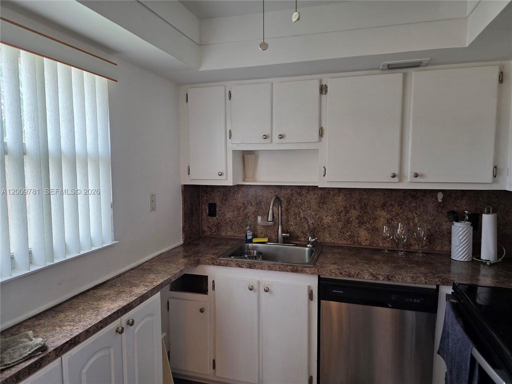 Photo of 232 E Saxony E Ln #232, Delray Beach, FL 33446 (MLS # A12009781)