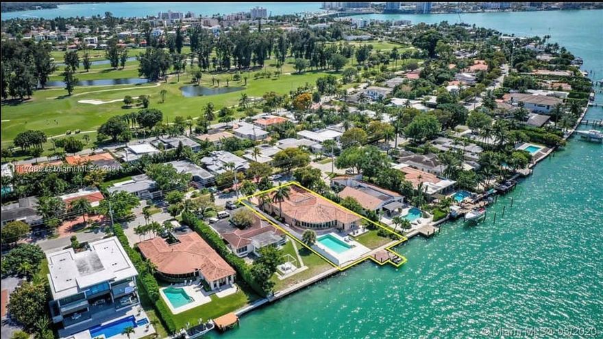 MOVE-IN ready Miami Beach home, on the apex of the island (best location for BOATERS). Experience dazzling SUNSETS and WIDE unobstructed views of Biscayne Bay. This 4,054 sf home sits on 76 ft of waterfront and offers 4 bdrms/4 baths plus additional Office/Media room. It features hurricane impact doors and windows, a deep heated Pool, dock, boat lift & is within close proximity to beaches, great restaurants, shopping at Bal Harbor & much more. Normandy Shores Island is a Gated Golf and Boating community with tennis courts, & an open-air gym/playground. Also available either with a renovation for $8M, or as a new construction tri-level with over 10,000 SF (see renderings in listing) for $13.5M. Please inquire for more details, architectural plans & timing.