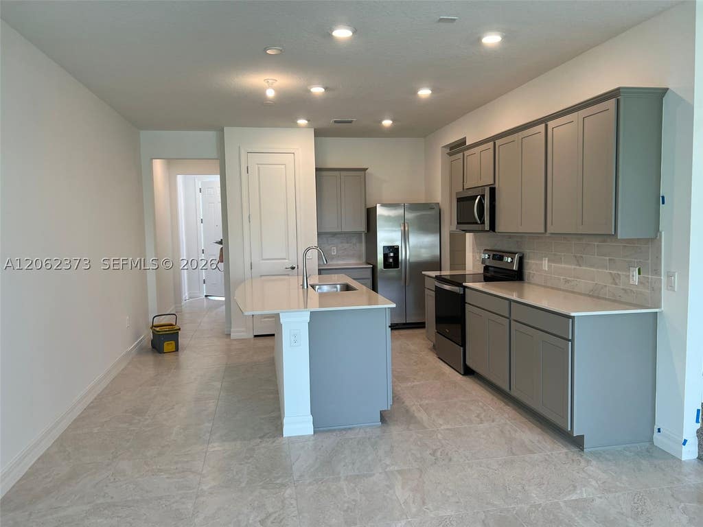 Photo of 6121 Rancho Ln #6121, Green Acres, FL 33415 (MLS # A12062373)