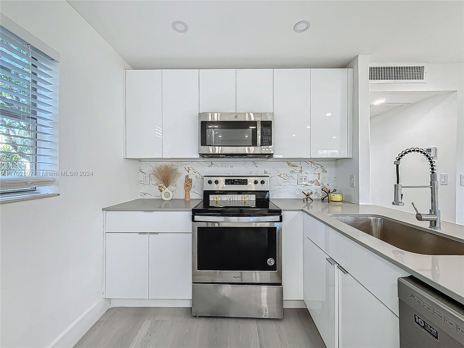 Take a look at this exceptional 2-bedroom, 2-bathroom condominium that has undergone a complete renovation! This residence has a fresh AC, a new water heater, and updated flooring. The bathrooms have been revamped to reflect a contemporary style. The kitchen features brand-new stainless steel appliances. Conveniently located just a short drive from the beaches of Delray, you can indulge in the sun, sand, and refreshing sea breeze at your leisure. Service pets are allowed. We will cover the capital improvement cost ($1,800) that new applicants have to pay, and the application fee ($150).  Numerous dining options and easily-accessible shopping. Seize the opportunity to own this fully renovated condo. It's first come first served.