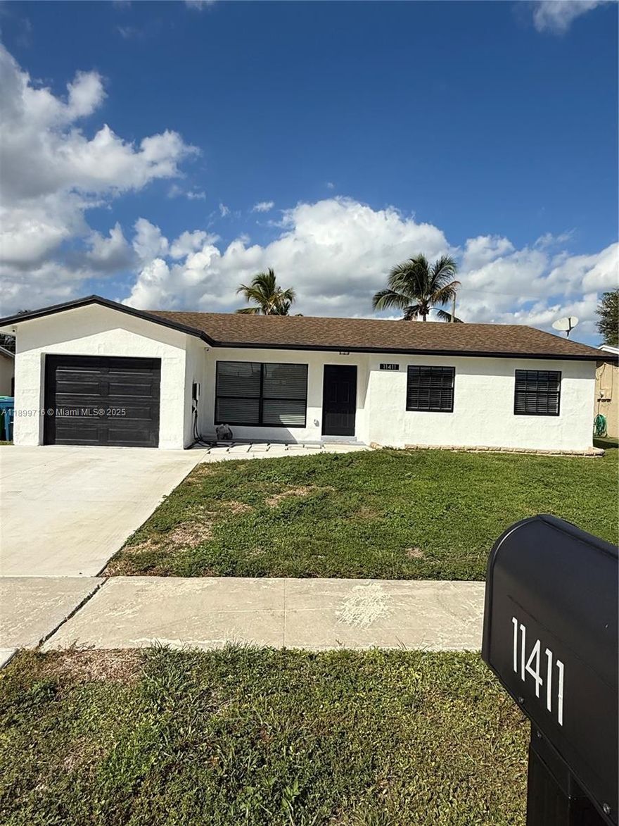 Updated 3/2 home in Sunrise! No HOA. Brand-new AC ducts (2025), newer TRANE AC (2021), plus hurricane-impact windows and doors, including the garage door. Freshly painted exterior, new concrete driveway, concrete covered patio with insulated roof. Some grass and a 10x10 concrete slab ready for a shed. EV-charger installation ready. Stainless steel appliances (new Samsung Range) and granite kitchen counter tops. Master bedroom has custom-built closet. Pool table and patio furniture negotiable. Turnkey and move-in ready. Located near Sawgrass Mills Mall, schools, parks, and major highways!
