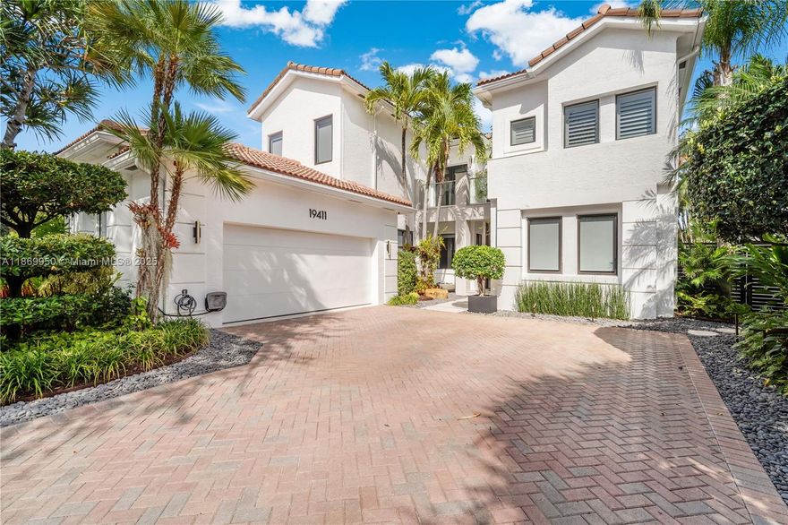 Welcome to Presidential Estates, North Miami’s most prestigious gated community. This renovated Garland Model blends luxury, security and lifestyle with 7 beds, 5.5 baths and 4,100+ sq ft of living space. Enjoy open golf and lake views from sunrise breakfasts on the terrace to poolside afternoons and starlit dinners. Features include vaulted ceilings, marble and wood floors, gourmet kitchen with island, walk-in closets and spa-style primary suite. The 9,219 sq ft lot offers balconies, lush patio, pool and BBQ. Two-car garage, 24/7 security and meticulous landscaping highlight the value of this exclusive enclave. HOA covers full maintenance and premium amenities. Minutes from Aventura Mall, beaches and Miami nightlife, this rare property combines design, location and lifestyle.