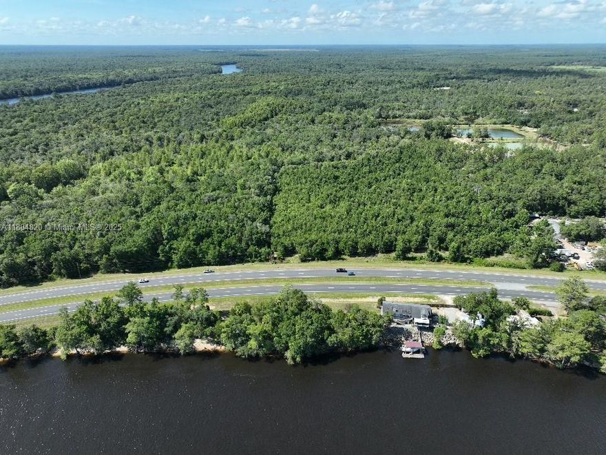 Overlooking the Suwannee River in Oldtown, Florida.  18 Acres suitable for development of recreational area, RV Park, or Commercial Plaza