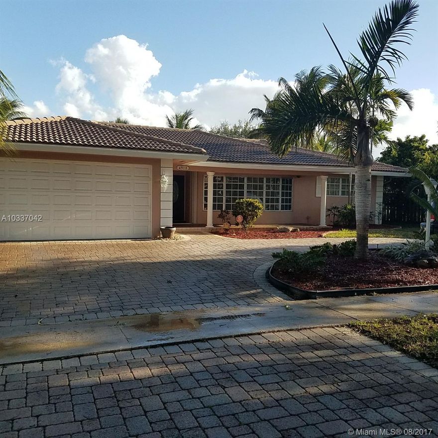 Beautiful 3 bedrooms, 2 bathrooms, re-designed Hollywood Hills Residence.  Featuring hardwood floors throughout the house; remodeled kitchen with granite countertop, stainless steel appliances, pantry and a pass-thru windows. Formal living and Dinning room, Family room, Cabana bath, Foyer.  French doors leading to 40' long covered sun-porch; 30 Ft. long pool with spa and paved deck; two car garage, barrel roof, circular paved driveway, in-house laundry room and so much more.