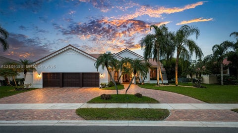 Photo of 355 Coconut Cir, Weston, FL 33326 (MLS # A12105153)