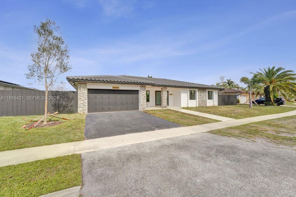 Photo of 16653 Golfview Dr, Weston, FL 33326 (MLS # A11959421)