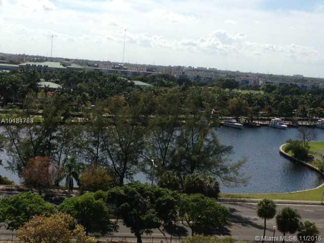 DIRECT WATER VIEWS FROM THIS UPDATED CONDO.CONTEMPORARY FLOORS THROUGHOUT.UPDATED KITCHEN & BATHS MAKE THIS A PERFECT UNFURNISHED RENTAL. LARGE WALK IN CLOSET IN BEDROOM. RENTAL PRICE INCLUDES COVERED PARKING, CABLE, WATER & EXTRA STORAGE. OLYMPUS OFFERS RESORT STYLE LIVING MINUTES TO BEACHES, AVENTURA MALL, GULFSTREAM AND AIRPORTS. 5 TENNIS COURTS, FITNESS CENTER, 24 HOUR SECURITY ALL IN A GATED COMMUNITY.