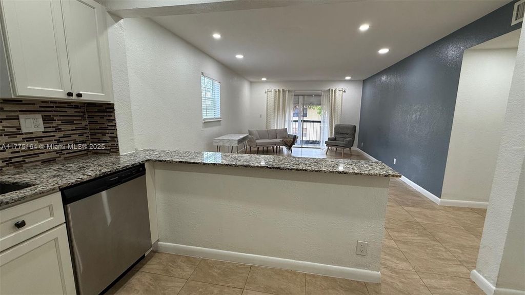 Photo of 4166 NW 90th Ave #204, Coral Springs, FL 33065 (MLS # A11775164)