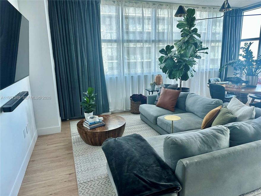 Welcome to the best line at 4Midtown! This FULLY RENOVATED corner unit offers 1,262 sq ft of modern living space with 2 bedrooms and 2 bathrooms. Enjoy stunning city and Biscayne Bay views through floor-to-ceiling windows, a wrap around balcony and a fully upgraded kitchen with top of the line appliances. Brand new AC unit just installed. Amenities include a pool deck, barbecue area, gym, steam room, sauna, 24 hour security and more.