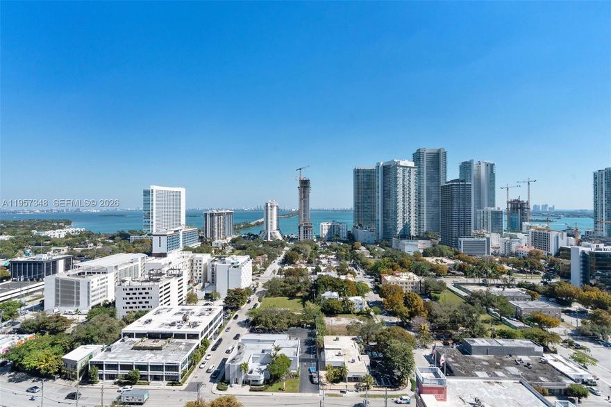 Welcome to the best line at 4Midtown! This FULLY RENOVATED corner unit offers 1,262 sq ft of modern living space with 2 bedrooms and 2 bathrooms. Enjoy stunning city and Biscayne Bay views through floor-to-ceiling windows, a wrap around balcony and a fully upgraded kitchen with top of the line appliances. Brand new AC unit just installed. Amenities include a pool deck, barbecue area, gym, steam room, sauna, 24 hour security and more.