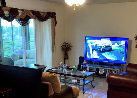 Photo of 3120 N Pine Island Rd #307, Sunrise, FL 33351 (MLS # A11937864)