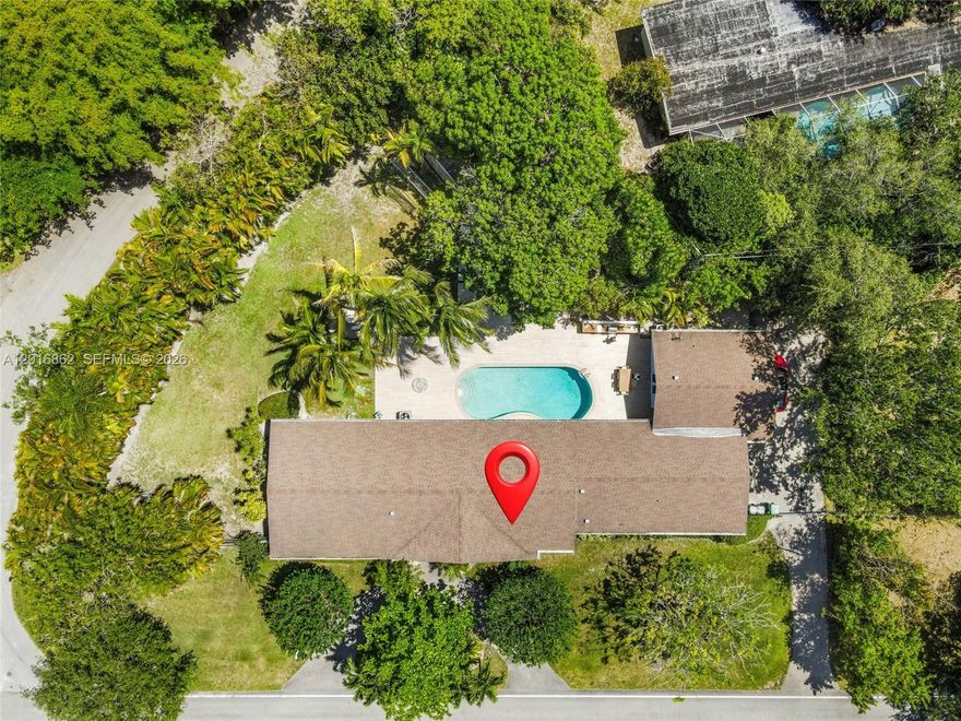 Exceptional Pinecrest home situated on a large corner lot with a pool and a detached mother-in-law suite—perfect for guests or additional flexible living space. This spacious residence features expansive living areas filled with natural light, generously sized bedrooms, and a beautifully updated interior freshly painted inside and out.

The home is equipped with hurricane-impact windows and doors, a 2017 roof, and a water filtration system for added comfort and peace of mind. The updated kitchen offers white cabinetry, stainless steel appliances, and ample space for entertaining.

Step outside to your private backyard oasis featuring a sparkling pool, oversized patio area, and lush green space ideal for relaxing or hosting gatherings. Located in one of the most desirable communities in South Florida, Pinecrest is known for its top-rated schools, beautiful tree-lined streets, parks, and premier lifestyle.