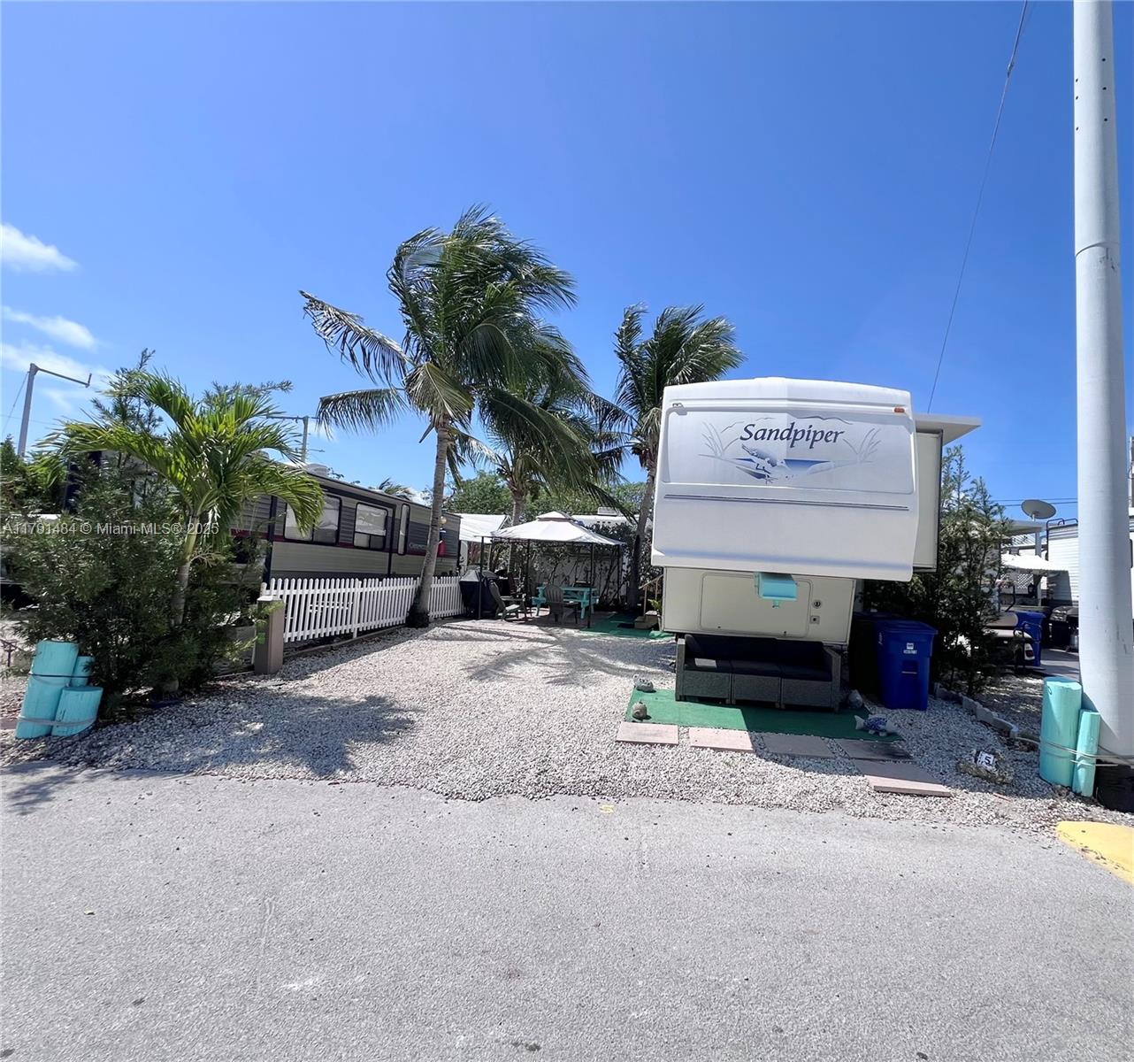 1,262 SF lot in Calusa Campground, Key Largo. Sewer and electricity connections in place. Bring your own boat — community features a boat ramp. Low HOA fee of $172/month. Amenities include a swimming pool, clubhouse, tennis and basketball courts, and 24-hour security. Excellent location, just 5 minutes from shopping and dining. Short-term rentals (Airbnb) allowed, making it a great investment opportunity with high rental returns. RV is included in the price. Don’t miss this opportunity in the Florida Keys!