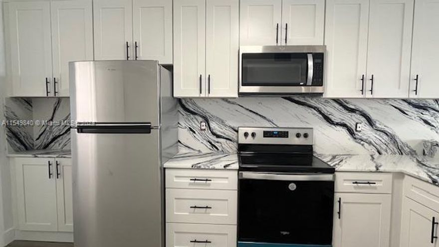 Beautiful apartment completely remodeled !!!! new kitchen, new appliances, spectacular Quartz on the kitchen counter, new bathrooms, laminate floors, 2 bedrooms, 2 bathrooms plus Den. for office, Washer and dryer machine inside the unit. Beautiful view. Located minutes from Aventura Mall and I 95. Ready to move in immediately!! Association $753.23. Special Assessments 1) $157.44 (finish August 2024) 2) $202.94 (finish February 2027)