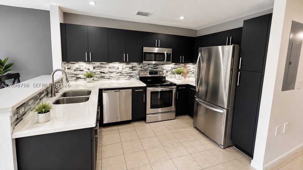 Photo of 3092 SW 129th Ter #102, Miramar, FL 33027 (MLS # A12098798)