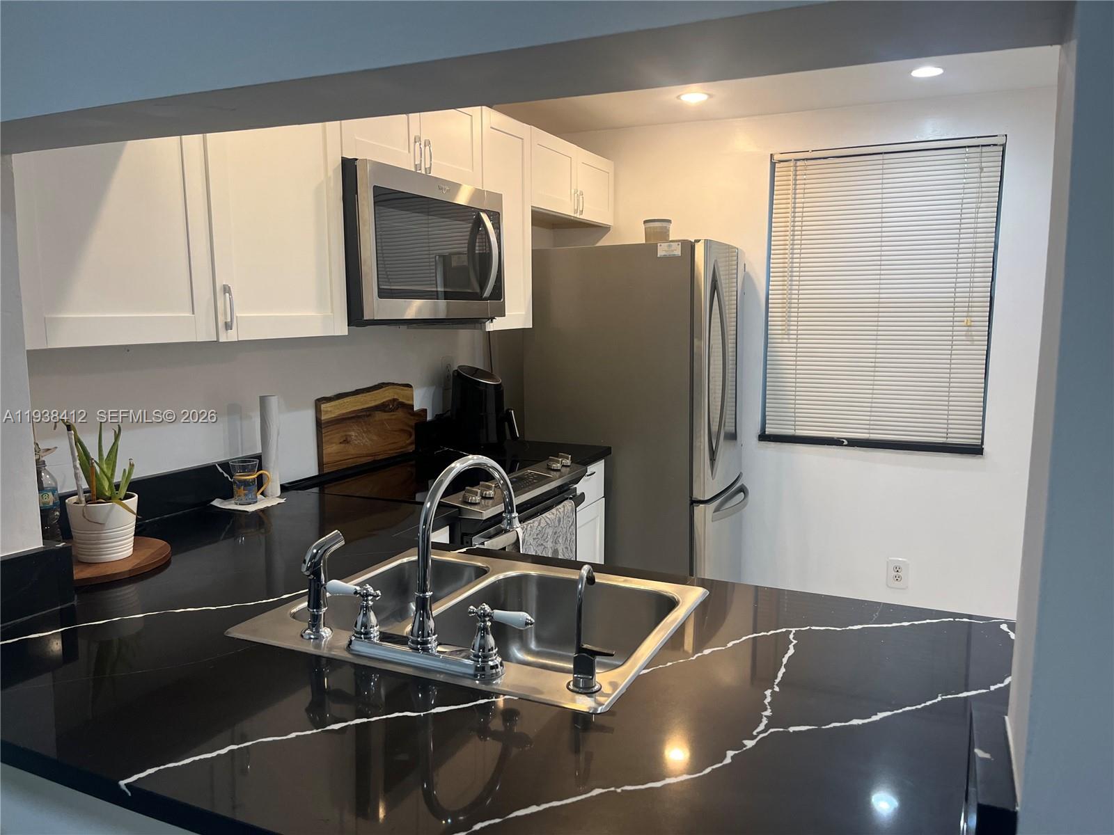 SUNRISE LAKES 217 CONDO - Residential