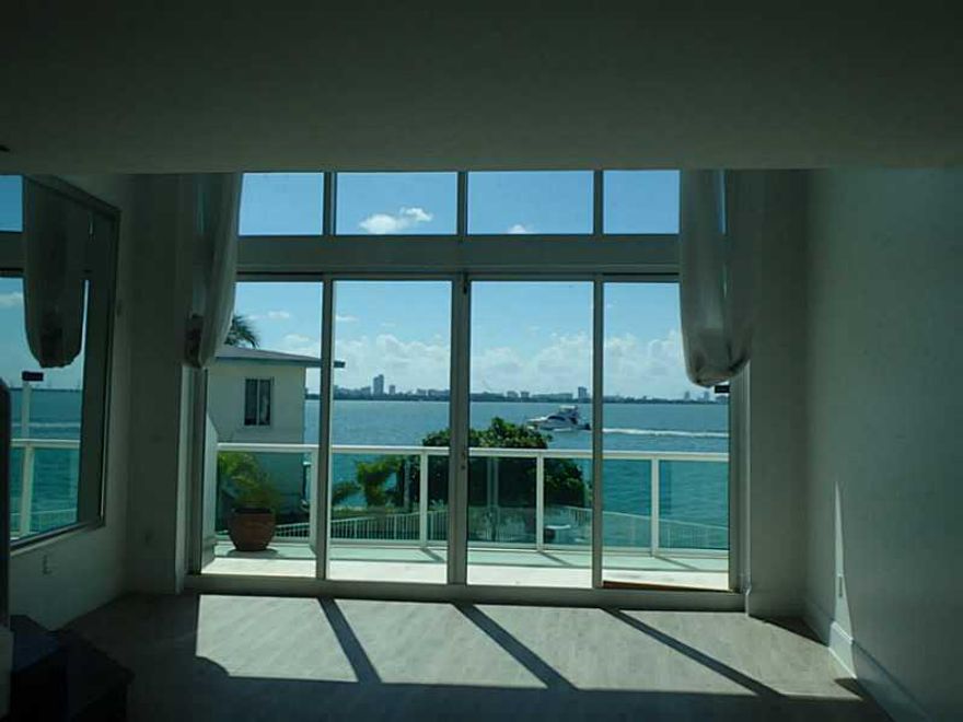Contemporary-boutique style building with only 22-units close to Downtown Miami, Brickell Avenue, SOBE and all major expressways. Spectacular 2-story loft with soaring ceilings, floor to ceiling glass, direct bay and pool views, 2-parking spaces, (gated e ntry) floating staircase, granite counter tops, s/s appliances, ceramic floors, private terrace, washer/dryer, high-impact doors and windows throughout. Looking for the perfect Tenant.  This unit is clean and ready to move into. This won't last!