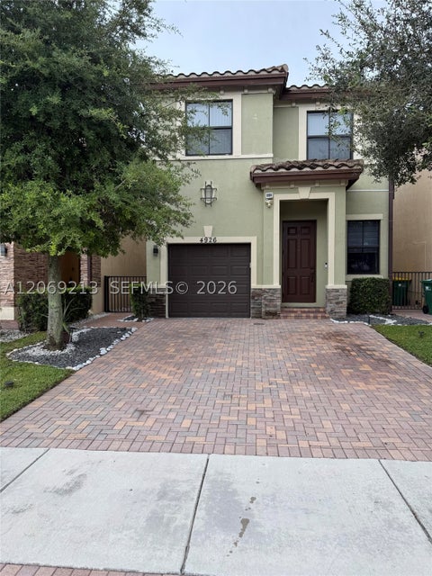 Photo of 4926 NW 57th Ct, Tamarac, FL 33319 (MLS # A12069213)