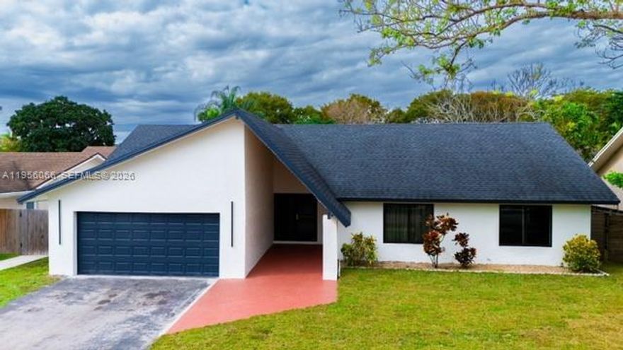 HIGHLY DESIRABLE CALUSA CLUB ESTATES!
Welcome to this beautifully remodeled one-story home featuring a spacious covered porch entry and a two-car garage. This 3-bedroom, 2-bath residence offers a bright and open layout with a family room and a stunning open-concept kitchen equipped with state-of-the-art appliances. Enjoy peace of mind with brand-new high-impact doors and windows, a new electrical panel and meter, roof (2020), and new A/C (2025). The expansive primary bedroom provides a comfortable retreat. Step into your private backyard oasis perfect for entertaining featuring a beautiful saltwater pool with heater and all brand-new pool equipment. Located in an excellent school district and conveniently close to shopping, dining, and public transportation. No HOA! Don't miss the opportunity to make this exceptional property your new home.