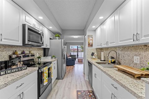 Photo of 13355 SW 16th Ct #211E, Pembroke Pines, FL 33027 (MLS # A11945304)