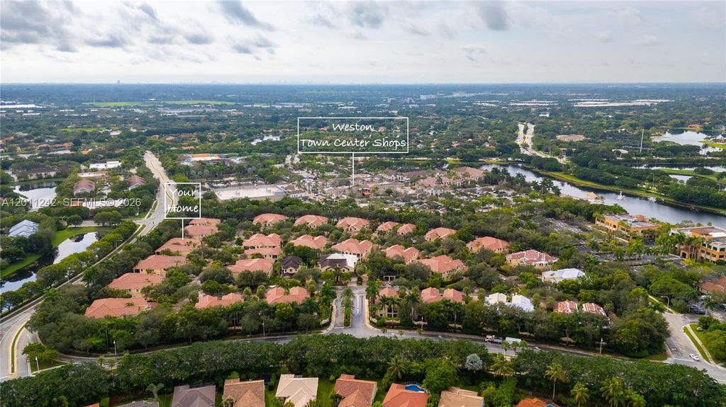 Photo of 1559 Passion Vine Cr Cir #7-2, Weston, FL 33326 (MLS # A12011242)