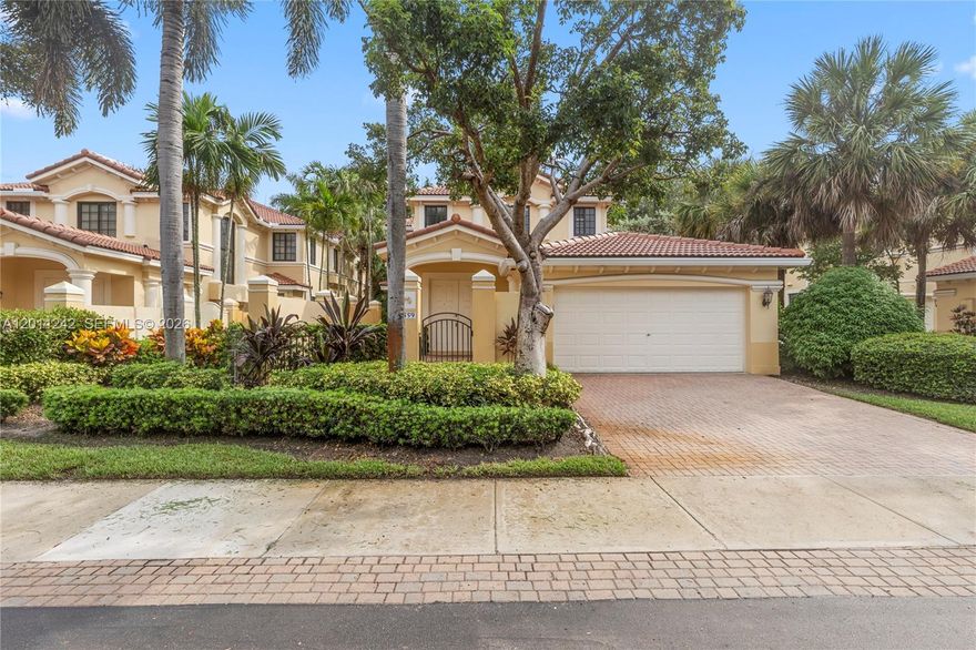Spacious coach home at the gated, small private enclave of Mariposa Pointe, combining comfort, convenience, and privacy in a beautiful setting. Featuring a Brand New Roof, private courtyard entry, bright and functional layout with 3 bedrooms, 2.5 bathrooms, laundry room, large screened balcony & 2 car garage. Highlights include impact windows and doors, tile and wood floors, a large kitchen with quartz counters, en-suite primary bath, and a generous walk-in closet. Electric chair lift & energy-saving, tankless water heater. Enjoy worry-free living with association services covering landscaping, painting, roof, insurance, and security. Just a short walk to Town Center shops and minutes from schools and highways.