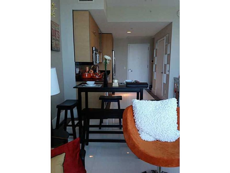 PICTURES SPEAK LOUDER THAN WORDS. FULLY FURNISHED, DECORATED BY A RENOWNED INTERIOR DESIGNER, TURN KEY, IMPECCABLE UNIT, WATER AND CITY VIEWS, ICONIC-AWARDED INFINITY BUILDING. TWO BALCONIES, ONE TO THE EAST, ONE TO THE WEST. EASY ACCESS TO RESTAURANTS, N IGHT LIFE, THE BEACH AND MAYOR HIGHWAYS. E-BLINDS, WALL MOUNTED TVS,  UNIT HAS IT ALL!!! JUST BRING YOUR TOOHBRUSH.