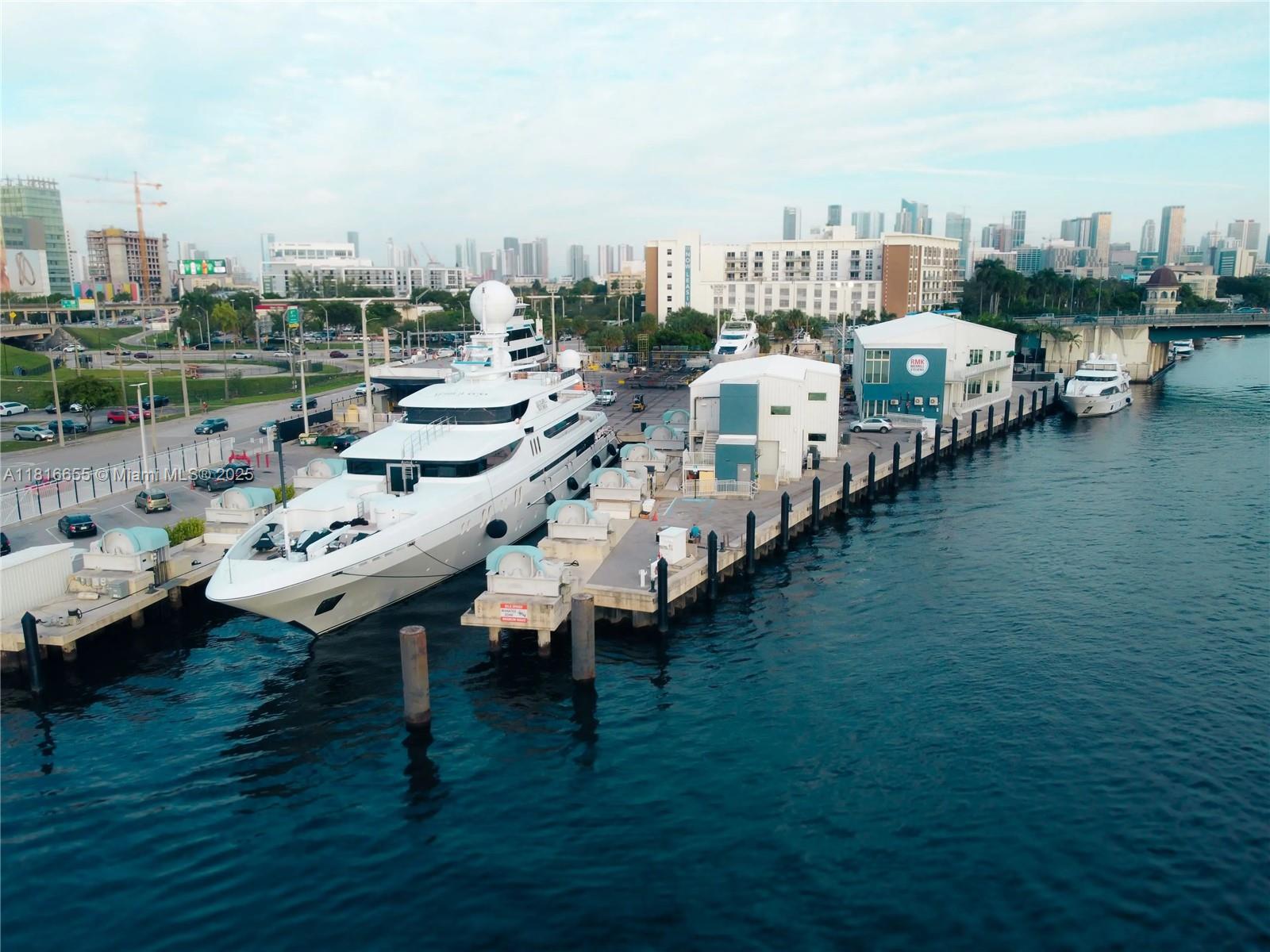 Yacht Boat Mechanic RMK Merrill-Stevens has small private office leases available within its Miami River industrial facility that make a smart fit for maritime industry sales or service providers. This warehouse's 2nd floor offices at 881 Northwest 13th Avenue is directly on the river within Little Havana's industrial commercial district, just a few blocks walking distance from Marlins Loan Depot Park Major League Baseball Stadium, abutting the Downtown residential district and 1-mile from Brickell's financial district.