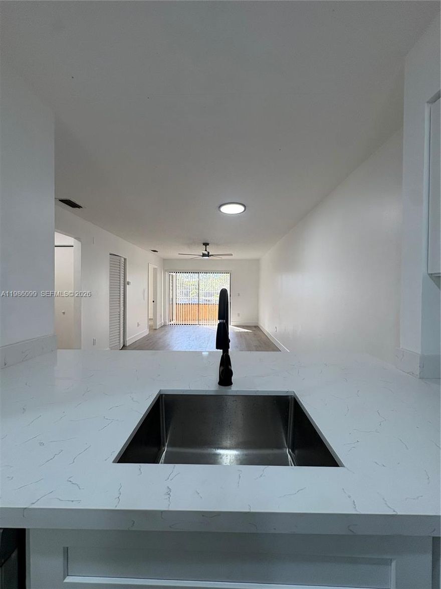 Beautifully renovated 2 bedroom, 2 bathroom apartment in the heart of Boca Raton. This move-in-ready residence features brand-new flooring throughout, a completely updated kitchen with new appliances, renovated bathrooms, and a fresh coat of paint. Enjoy indoor-outdoor living with a screened-in patio, perfect for relaxing or entertaining. Ideally located near FAU, shopping, and Boca Raton's best dining and restaurants. A perfect blend of modern updates, comfort, and convenience.