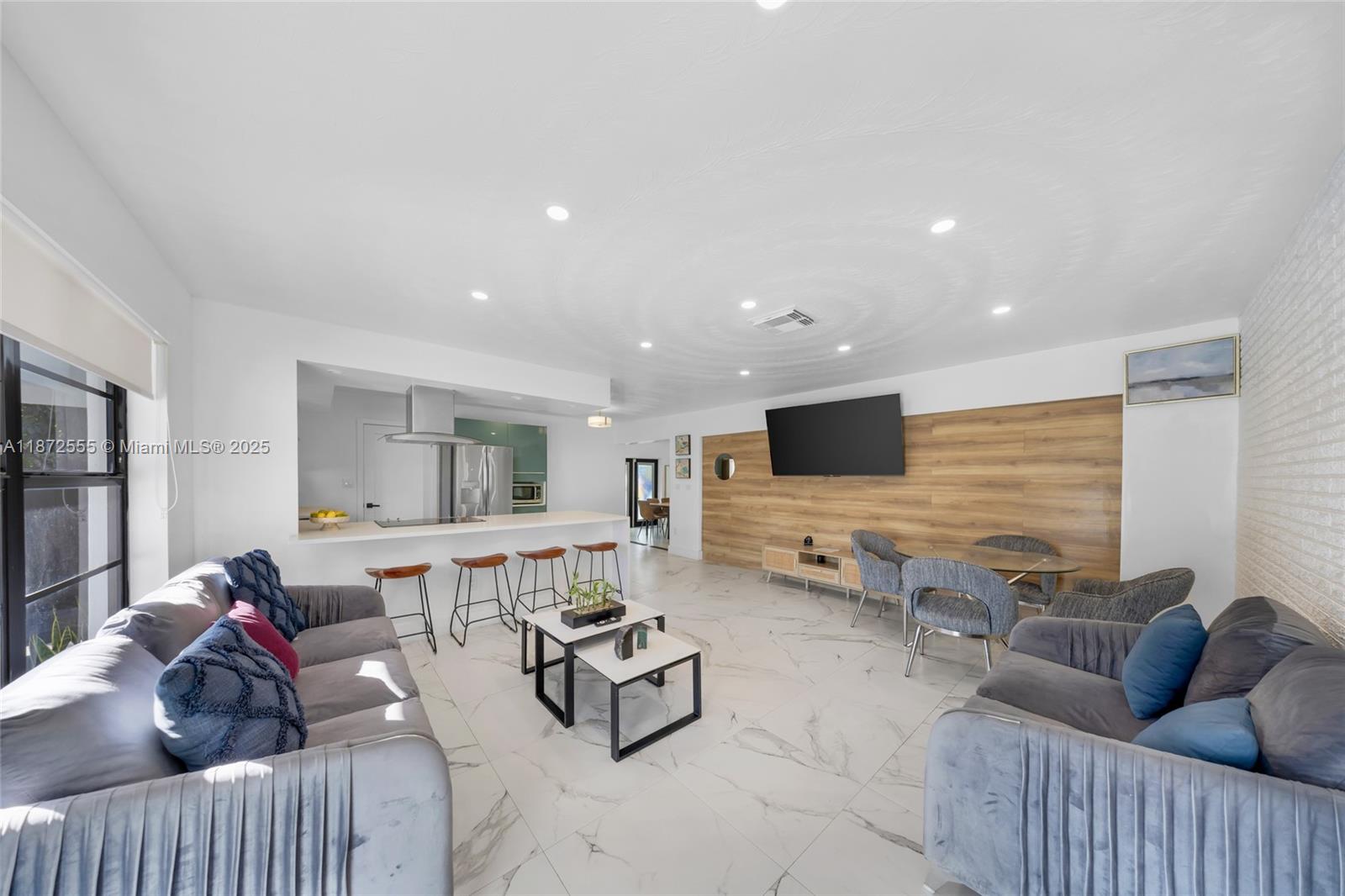 This impeccably updated and fully furnished 4-bedroom, 3-bathroom residence is more than a home—it’s an opportunity. Nestled in unincorporated Dade County, it offers the flexibility of short-term rentals, making it ideal for both investors and end-users. Every detail has been elevated with brand-new fixtures, custom closets, and state-of-the-art appliances.
Step outside to your own private oasis featuring a resort-style pool and expansive outdoor BBQ lounge—perfect for entertaining or relaxing in true Miami fashion. The coveted location places you minutes from the sophistication of Miami Shores and Biscayne Park, with effortless access to world-class dining, shopping, and nightlife.