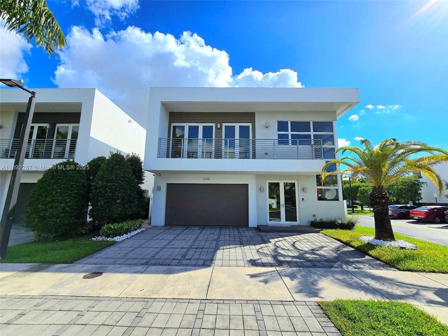 This Luxurious Modern Architectural cosmopolitan-style home is one of the best options for anyone's needs. Priced to Sell! Has all of the best upgrades the developer offered at MODERN DORAL 45. This is a 2-story, 5 bedroom/4 bath with 2 cg, private pool on a corner lot, high ceilings & vast living spaces, formal living room & dining room  Bosch appliances, under-counter wine cooler & quartz countertops, imported Italian wood cabinetry, impact windows & doors, concrete roof, roman tub in the master bedroom, smart home technology, elegant interior architectural details, beautiful balconies, landscaped hedge and fence in backyard separating your property from neighbors, community is gated and 24 hrs security, gym, pool, bbq area, children's playroom, sun deck more