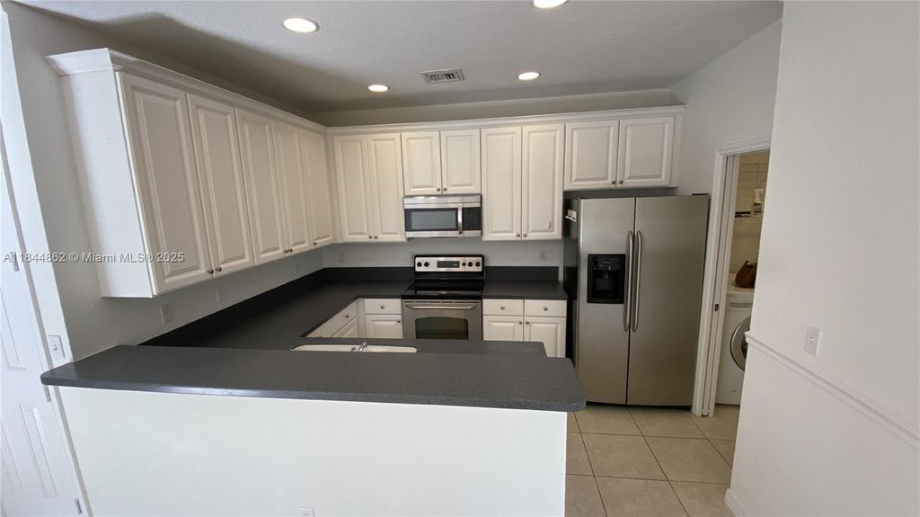 Photo of 1932 SE Grand Dr, Port St Lucie, FL 34952 (MLS # A11844862)