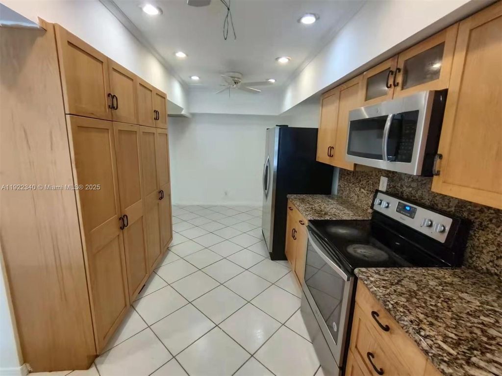 Photo of 3629 Coral Springs Dr #3629, Coral Springs, FL 33065 (MLS # A11922340)
