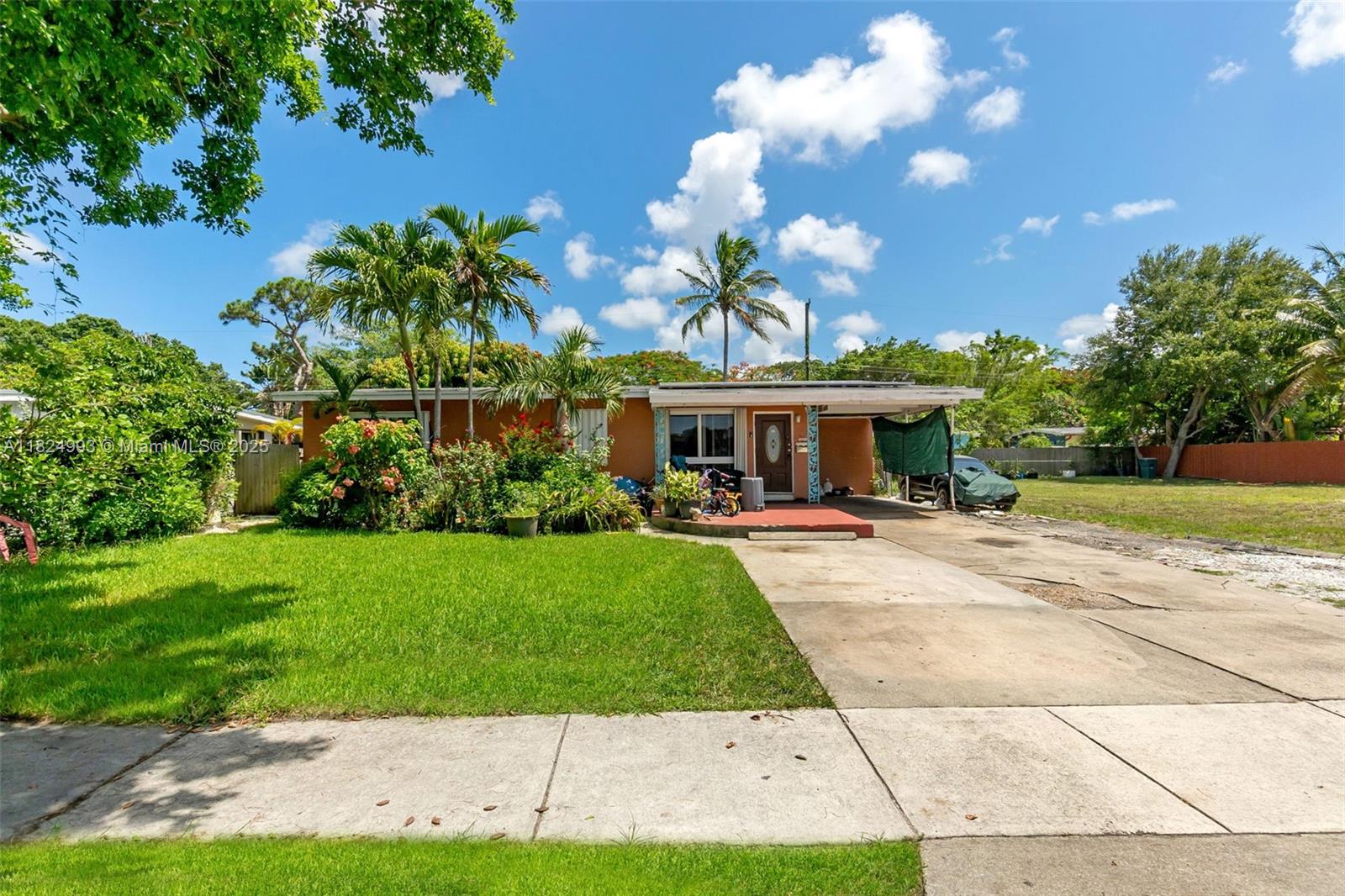 Located in the desirable Sherwood Forest community in Fort Lauderdale, this 3-bedroom, 2-bathroom single-family home includes a versatile family room currently used as a 4th bedroom. The home features neutral tile flooring throughout, a spacious kitchen with wood cabinetry and stainless steel appliances, and vaulted ceilings with updated recessed lighting. New solar panels will remain with the property and will be paid off at closing. AC is from 2018. Enjoy a fully fenced backyard with fruit trees. Some windows are impact-rated; all have accordion shutters. Conveniently located near major highways, shopping, and dining.