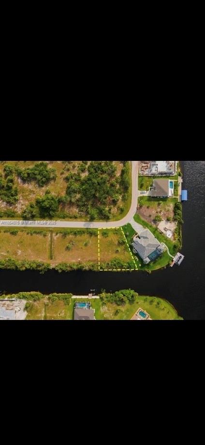 Discover the ultimate waterfront lifestyle! This Gulf-access property offers a dream location with sailboat access and no bridge waterways, perfect for seamless boating from your backyard. Just 15 minutes from the beautiful beaches of Boca Grande Island, Englewood Beach, and Manasota Key, you’ll be living near some of Florida’s finest coastal destinations. Enjoy a golfer’s paradise with six semi-private courses only 10 minutes away, and find shopping, dining, and vibrant beach bars with live music close by. Whether you’re fishing, boating, or soaking in the serene Northern exposure, this property promises the Florida lifestyle you’ve been waiting for!