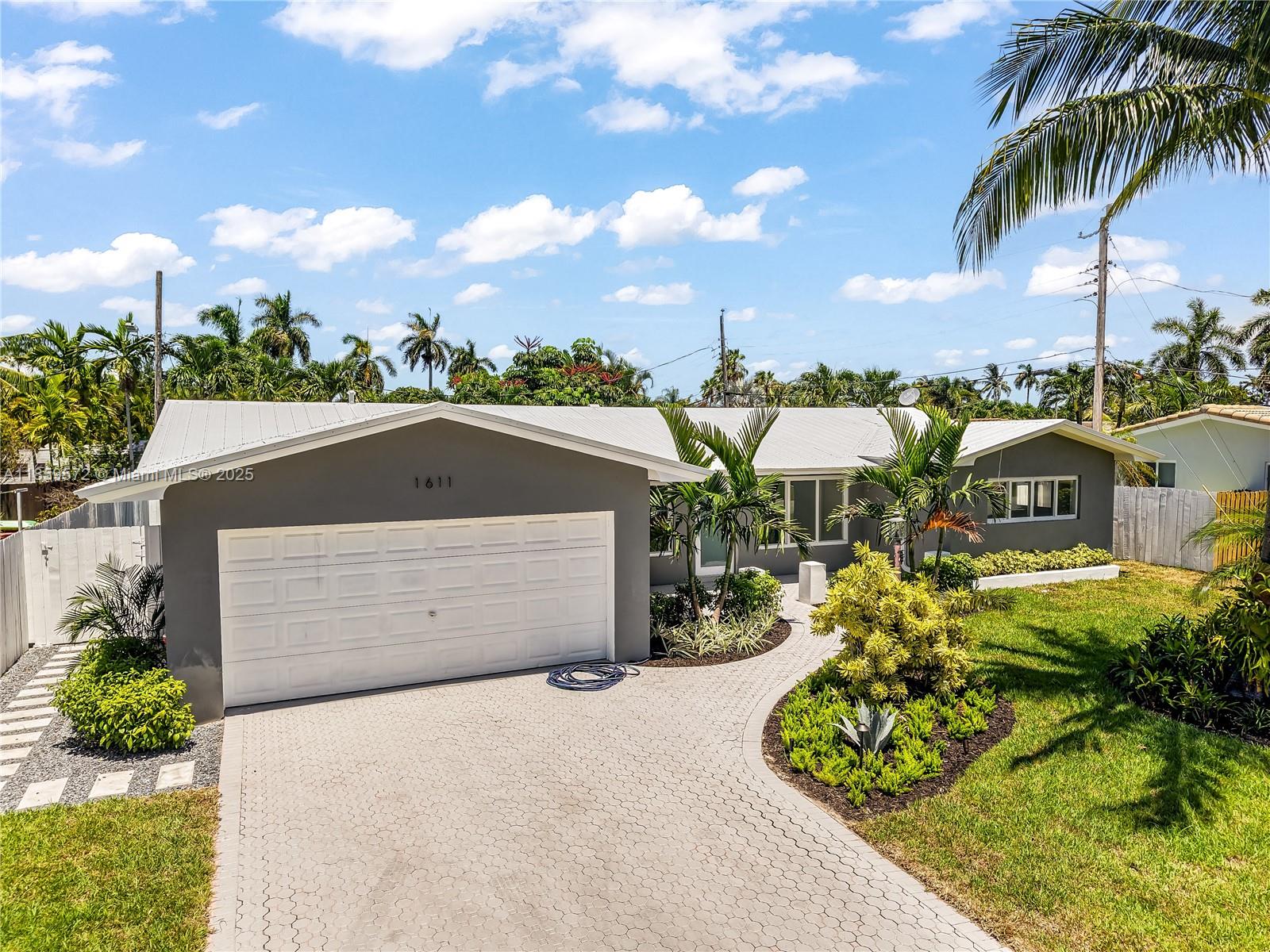 Welcome to this stunningly remodeled retreat in the heart of Fort Lauderdale! Featuring modern finishes, abundant natural light, and an open-concept design, this home is a perfect blend of elegance and comfort. Simply relax in your lush backyard oasis with full turf! No need to pay for weekly lawn services. Owner invested in landscaping. Inside, you'll find high-end designer finishes, a sleek gourmet kitchen with prep island, spa-inspired bathrooms, and spacious living areas perfect for entertaining. Home was rebuilt top to bottom in 2023-2025: roof, plumbing, electric, impact windows, new pool. All renovations done with permits.