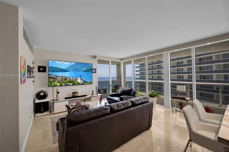 Beautifully upgraded corner residence at Beach Club Towers Tower III featuring 2 Bedrooms + Den and 2 bathrooms. This bright and spacious unit offers a remodeled kitchen with marble and wood finishes, center island, upgraded lighting throughout, custom wood entry door, marble floors in living areas, and wood flooring in the bedrooms. Enjoy two private balconies and an open layout with plenty of natural light. The den is ideal for office or guest space. Resort-style amenities include beachfront pools, fitness center, spa, valet, concierge, 24-hour security, and beach service. Excellent opportunity to own a customized corner unit in one of Hallandale Beach’s most desirable oceanfront communities.