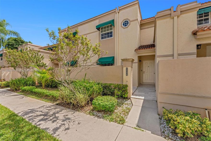This stunning 2-bedroom, 2-bathroom home has been fully updated and features a washer and dryer with custom cabinetry. Enjoy new flooring throughout, including on the front and back patios, along with additional storage space. No membership is required. Relax in your backyard patio under the mango tree. Perfect for your family—with no age restrictions and pet-friendly (some restrictions apply). Come see it for yourself!