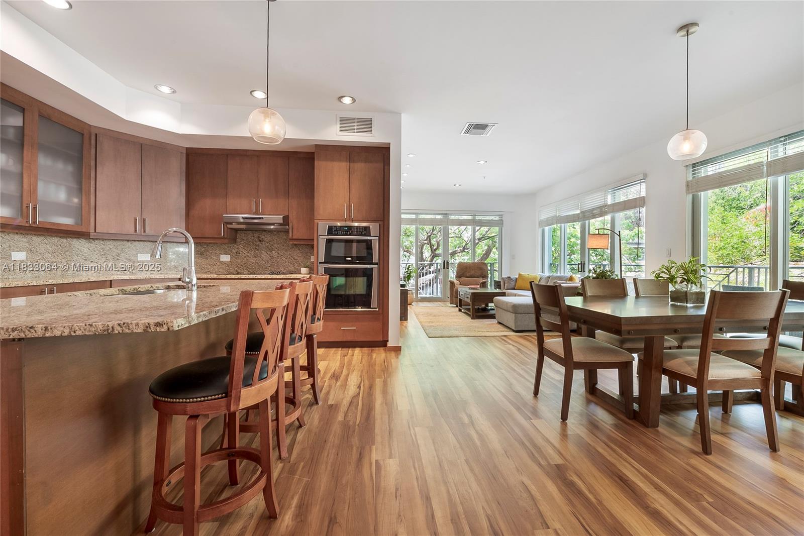 Impeccable treehouse feel, 3 bed 3 bath in the heart of Coconut Grove. Excellent layout, updated kitchen and bathrooms, and light-filled living spaces make this unit truly one-of-a-kind. Urban living, Boutique 9-unit building just minutes to Downtown Miami, South Miami, Coral Gables, Key Biscayne, and the Beaches.