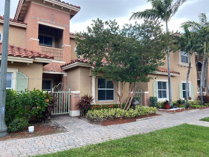 Beautiful 2-bedroom, 2.5-bath townhouse located in a desirable gated community in Pembroke Pines. Featuring 1,379 sq ft of bright, open living space, this home offers a modern kitchen, spacious living and dining area, and a convenient half bath on the main floor. Upstairs, both bedrooms include private bathrooms for comfort and privacy. Enjoy in-unit laundry, assigned parking, children's playground and access to a community pool. Ideally situated near Pembroke Lakes Mall, C.B. Smith Park, major highways, and top-rated schools, this 2007-built townhouse offers modern living in a peaceful, well-maintained setting, perfect for professionals, couples, or small families.