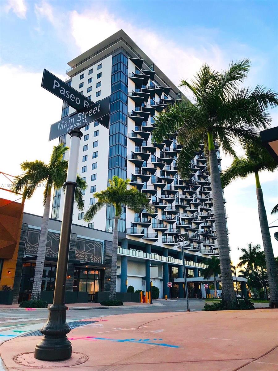 Welcome to Unit 1604 in Downtown Doral! This spacious and elegant 2-bedroom + convertible den, 2-bathroom residence offers 1,063 sq. ft. of beautifully designed living space. The den can easily function as a third bedroom or office. Enjoy custom walk-in closets, blackout shades, and an assigned covered parking space. Wake up to breathtaking east-facing views of one of the top professional golf courses in the U.S., and from the resort-style pool, watch airplanes fly by up close—just like in San MartÃn. Located in a walkable, vibrant community steps from top-rated schools, parks, fine dining, shopping, and more. Residents enjoy premium amenities including a gym, spa with sauna, kids’ playroom, conference rooms, and social spaces. Downtown Doral—where comfort, convenience, and lifestyle meet.